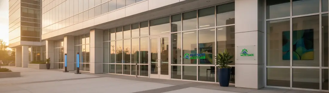 A modern commercial office building at golden hour